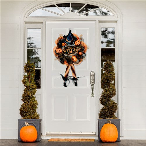 Bewitching Halloween Wreath with Pumpkins and Hanging Feet 24"